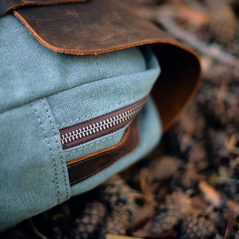 cotton cloth backpack helsinki close up, metal zipper, reinforced stitchings, leather trim