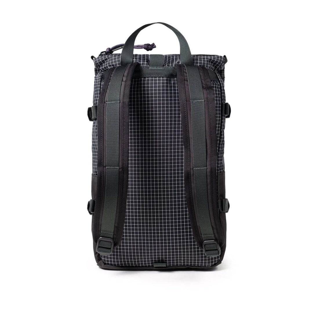 Rear view of the Rover Pack Mini in black and grid — ripstop back panel and grey shoulder straps