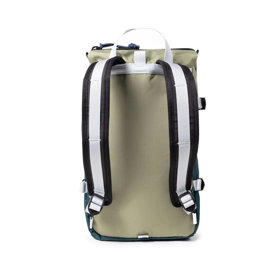 Rear view of the Rover Pack Mini in oil green — sage back panel with white shoulder straps