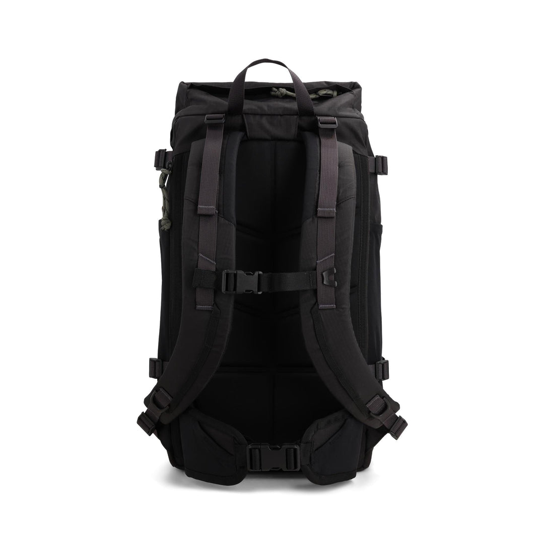 Rear view of the Rover Trail Pack 24L in black and neutral — black back panel and tan straps