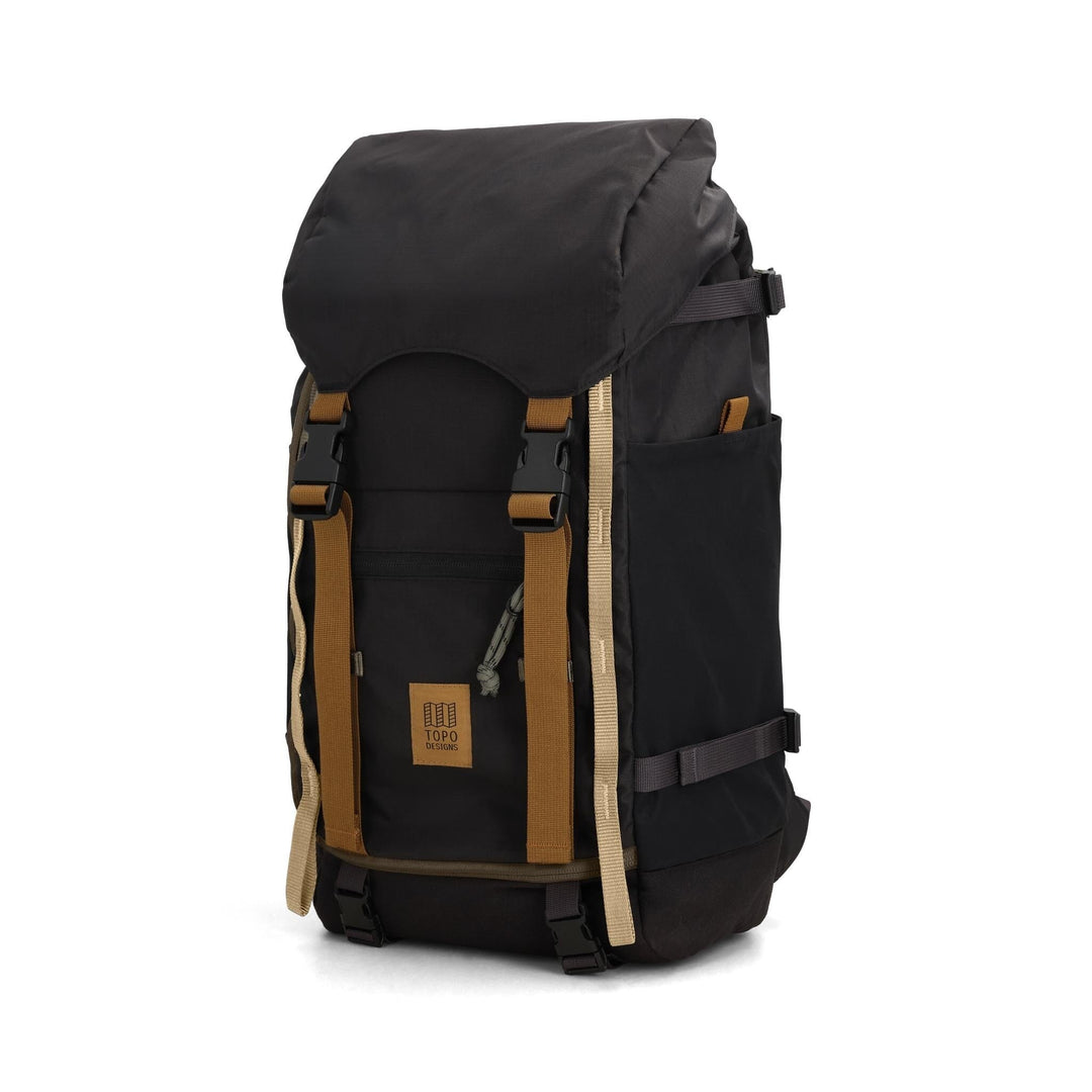 Side profile of the Rover Trail Pack 24L in black and neutral with vertical compression straps