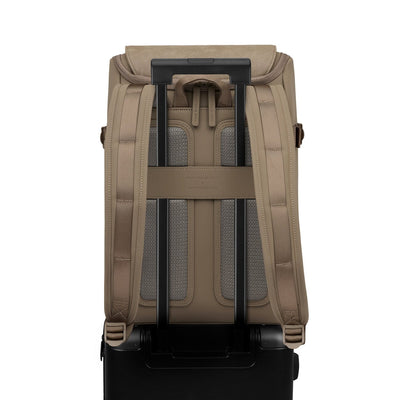 Travel-ready backpack attached to a suitcase handle, ideal for airport travel and weekend getaways