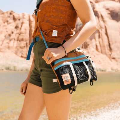 summer woman wearing topo designs mountain accessory shoulder bag