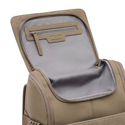Close-up of the Bali Medium Backpack’s top compartment with zip pocket and branded Kapten & Son leather detailing