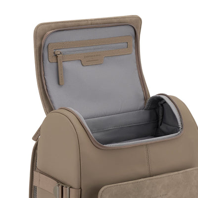 Close-up of the backpack’s top opening and inner pocket, highlighting the refined stitching and easy-access design
