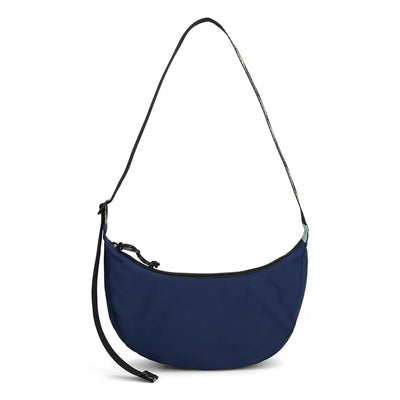 Back of the Topo Designs Moonlight bag in midnight blue, clean and compact for urban carry