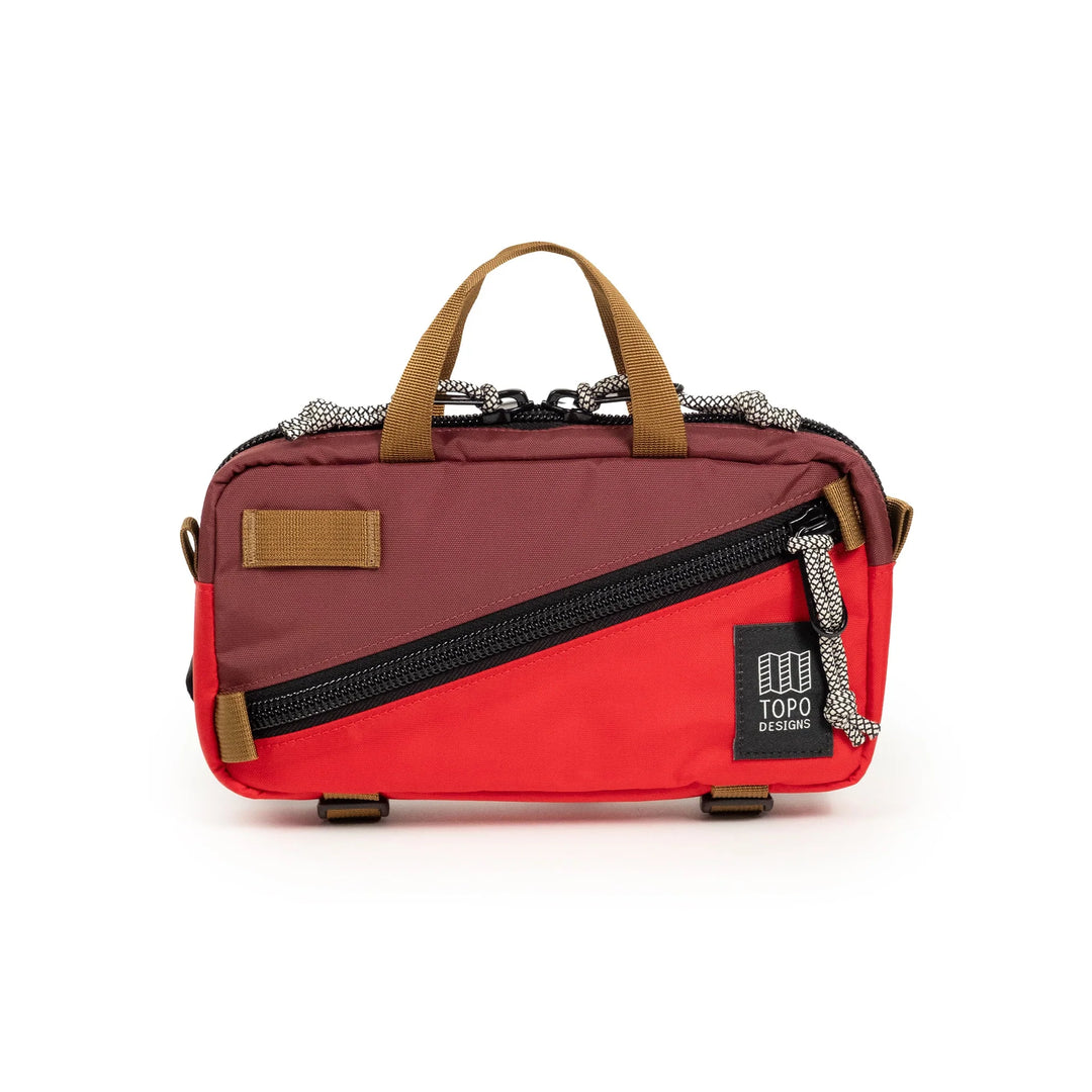 Topo Designs Mini Quick Pack 1.7L in Maroon and Salsa — front view with diagonal zip and top handle