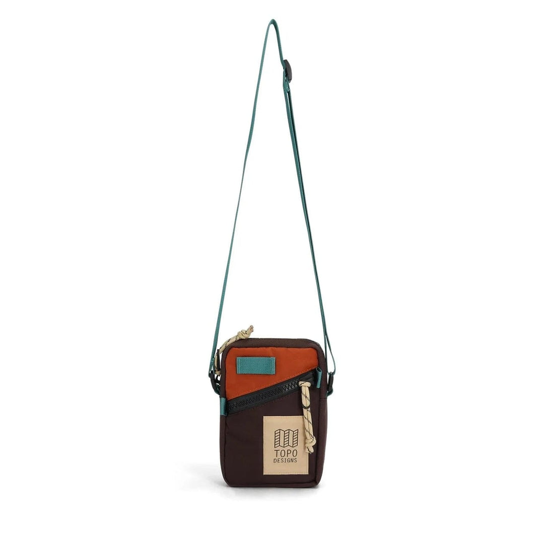 Topo Designs Mini Shoulder Bag in clay and chocolate — front view with rust top and brown bottom