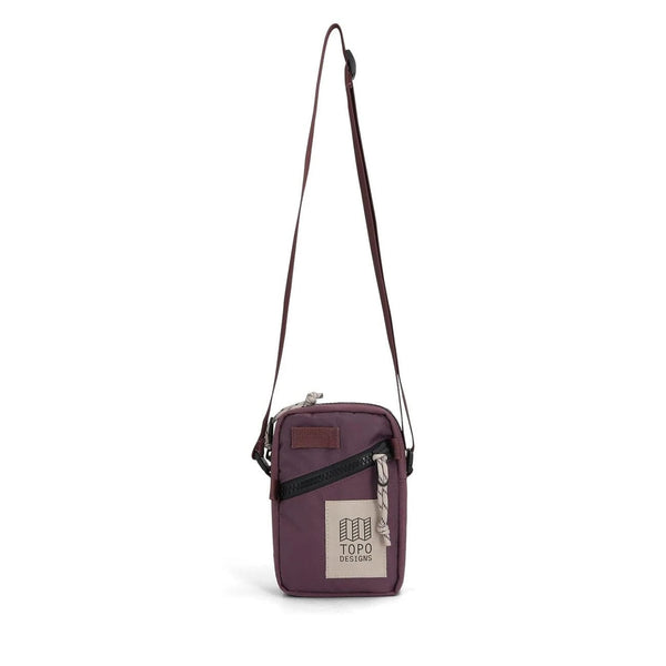 Topo Designs Mini Shoulder Bag in huckleberry — front view with deep purple body and adjustable strap