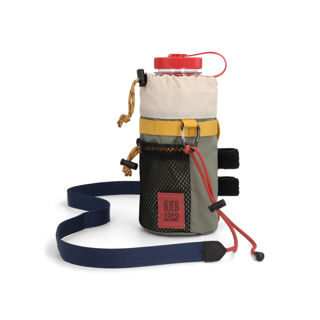Topo Designs Mountain Hydro Sling in bone white and beetle — front view with cream and sage color blocking