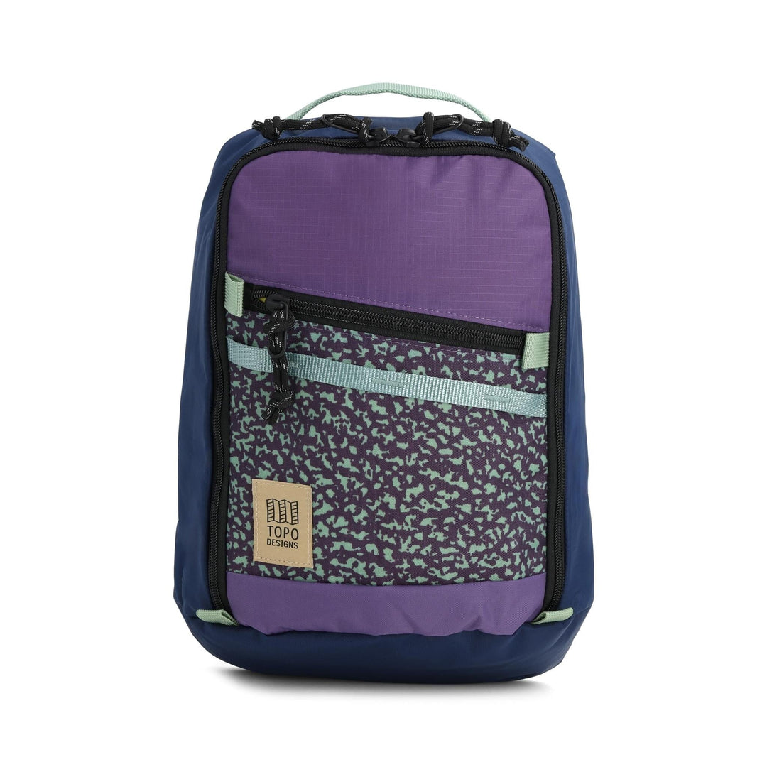 Topo Designs Mountain Sling Bag in loganberry and crackle — front view with deep red body and crackle pattern