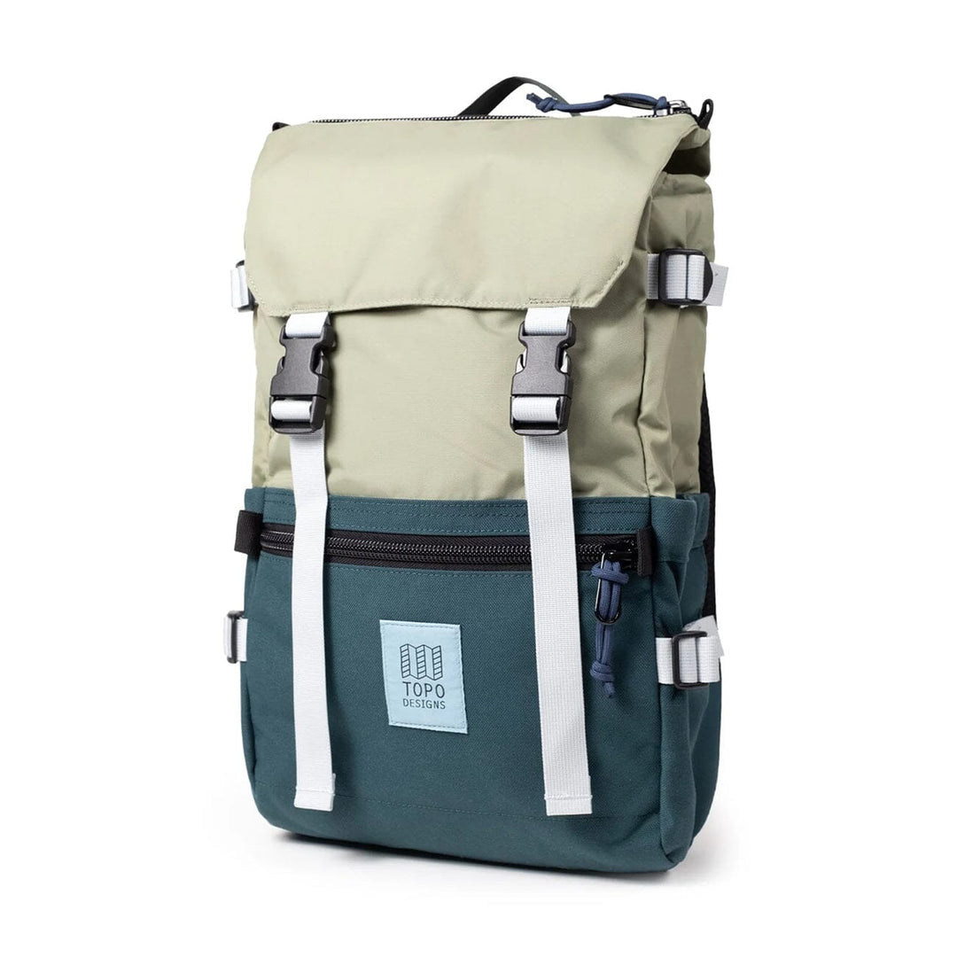 The Rover Pack Classic in oil green and dark pine — three-quarter view with white compression straps