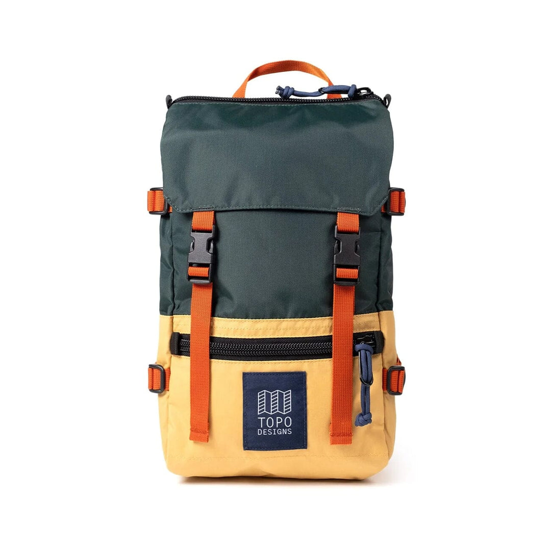 Topo Designs Rover Pack Mini in forest and goldenrod — front view with dark green flap and tan body
