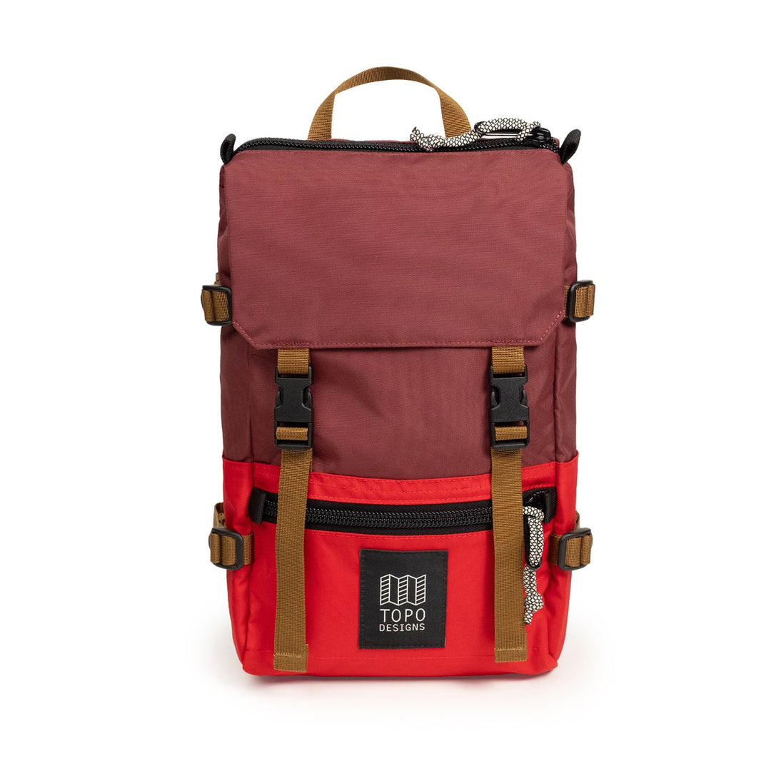 Topo Designs Rover Pack Mini in Maroon and Salsa — front view with cinch buckles and leather logo patch