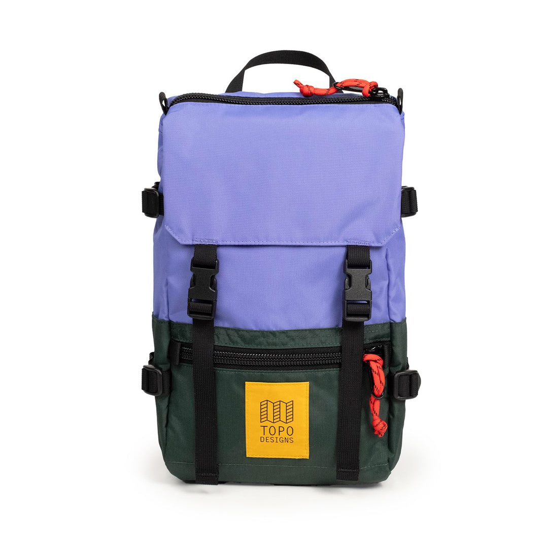 Topo Designs Rover Pack Mini in Very Peri and Forest — front view with cinch buckles and leather logo patch