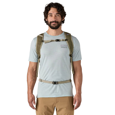 Man wearing a River Rock Green hiking backpack with breathable straps and smart gear loops