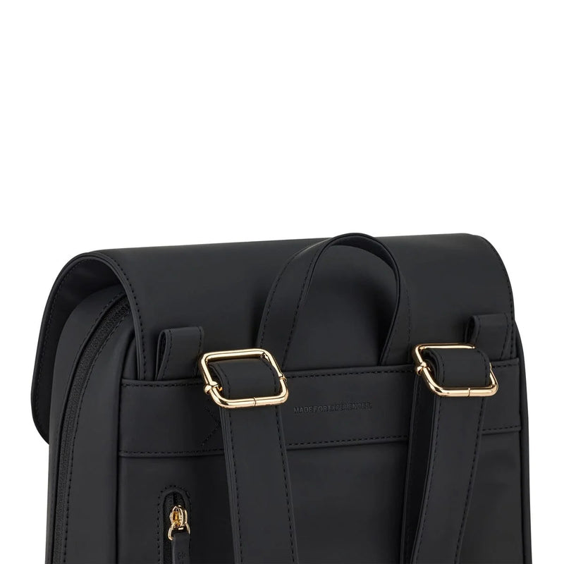 Gold buckle straps and embossed branding on the rear panel