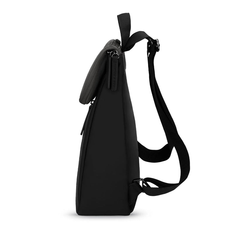 Ultra-slim side profile of the black Vallen daypack — only 11&nbsp;cm deep, ideal commuter backpack