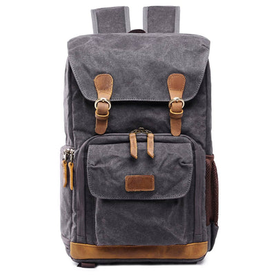 Waterproof Canvas Camera Backpack with comfortable shoulder straps and decent padding, featuring a separate compartment, adjustable dividers and a front pouch, ideal for adventure photographers