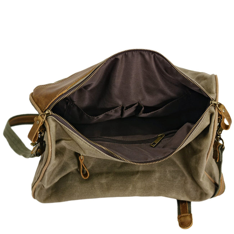 waxed canvas leather sling bag roomy main compartment with pockets