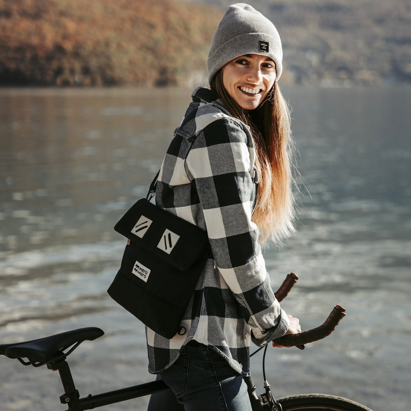 woman bicycling mero mero meije pouch convertible shoulder bag