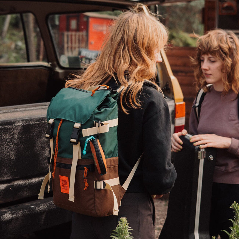 woman traveler wearing rover classic pack