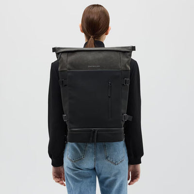 woman wearing all black helsinki backpack kapten son model lifestyle