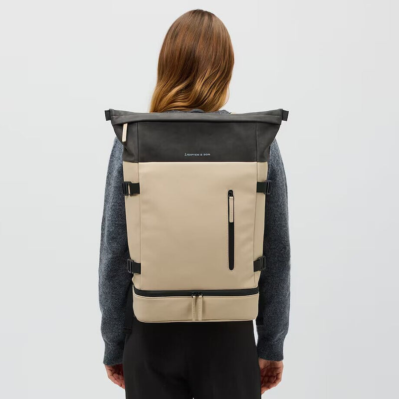 woman wearing cream black helsinki backpack kapten son model lifestyle