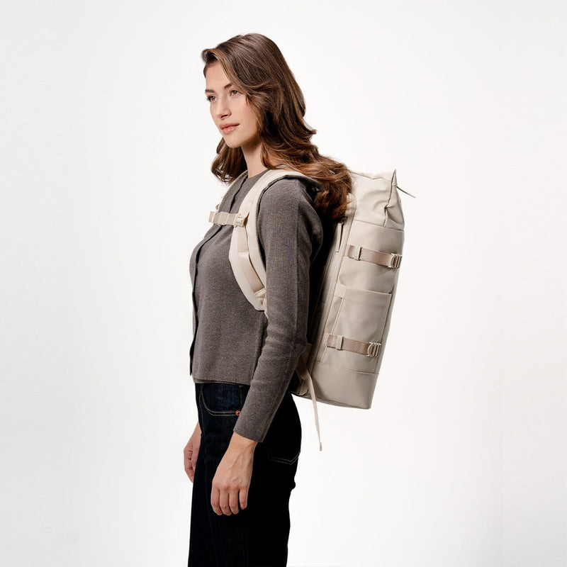 woman wearing kapten and son helsinki pro backpack sandstone, side view