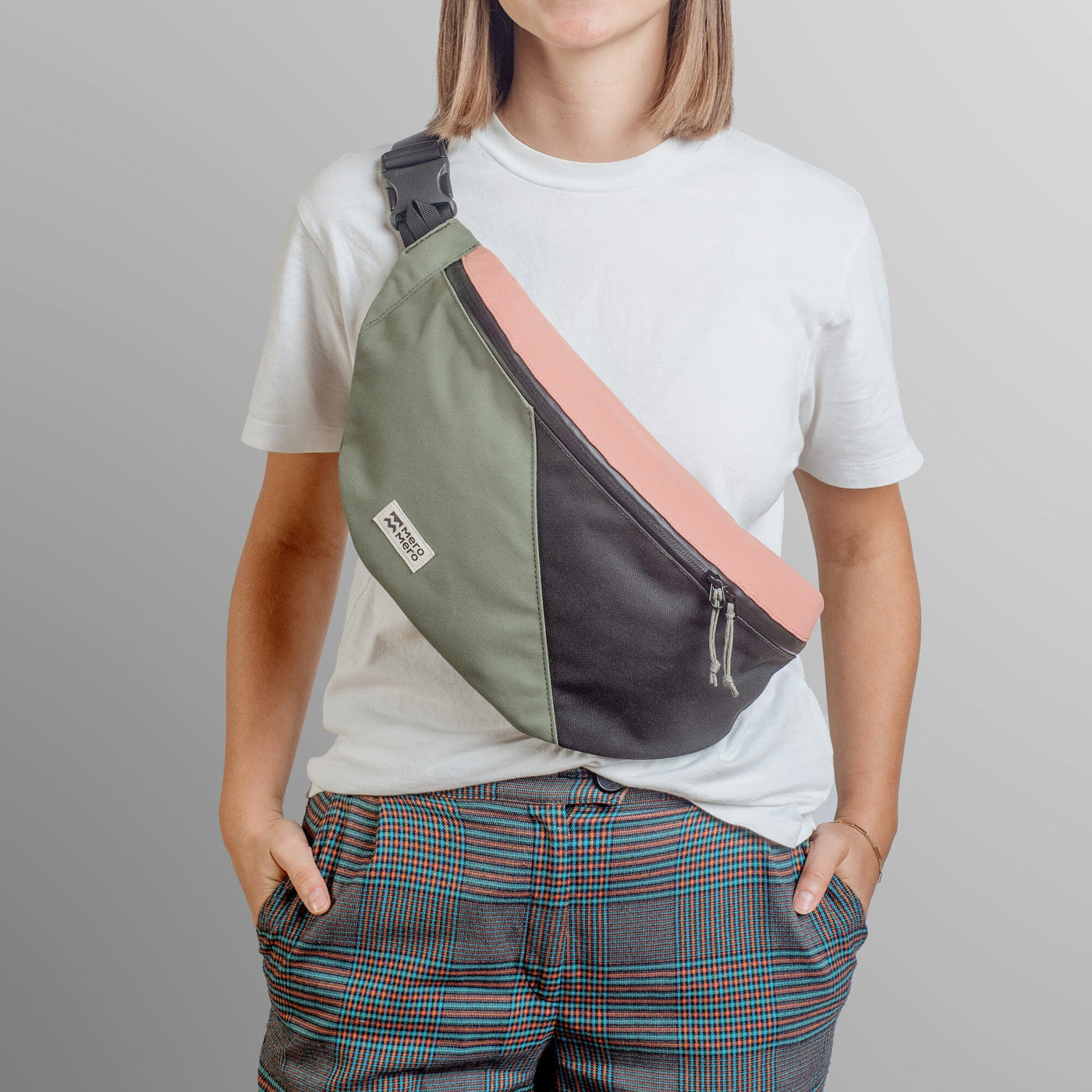 woman wearing mero mero hoian recycled bum bag as cross body bag