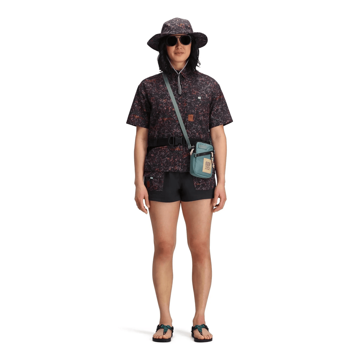 woman wearing topo designs mini shoulder bag 1L as chest bag