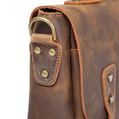 reinforced buckle attach point for the leather shoulder strap of the leather shoulder bag