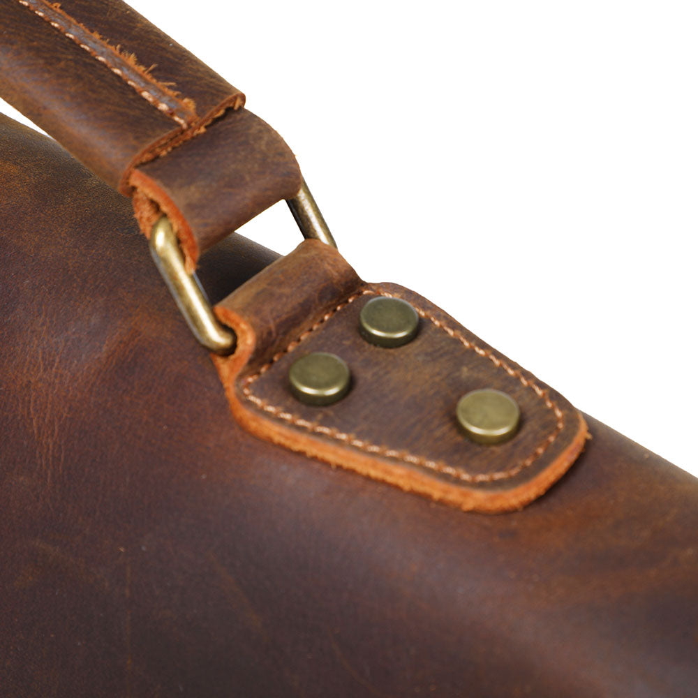 top leather handle with metallic buckle and protective rivet