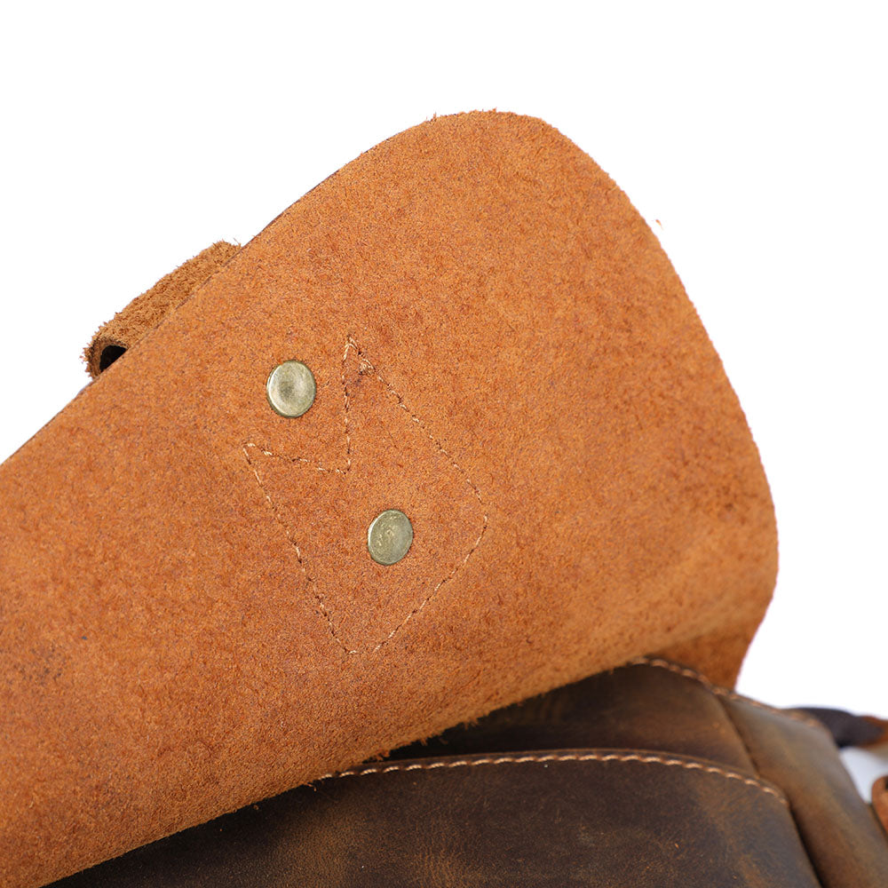 leather cap of the leather shoulder bag