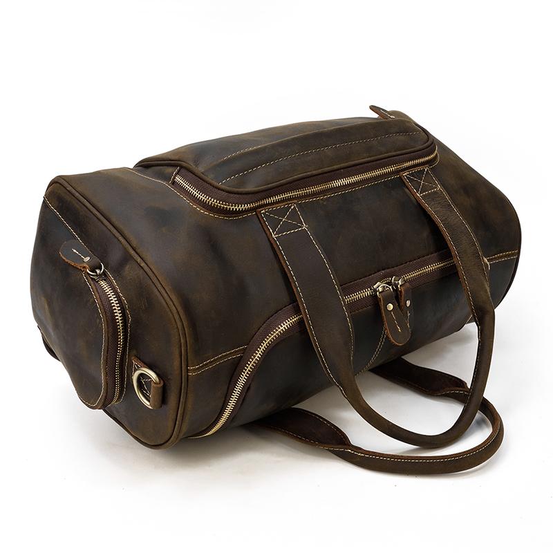 ajustable shoulder straps men's leather holdall