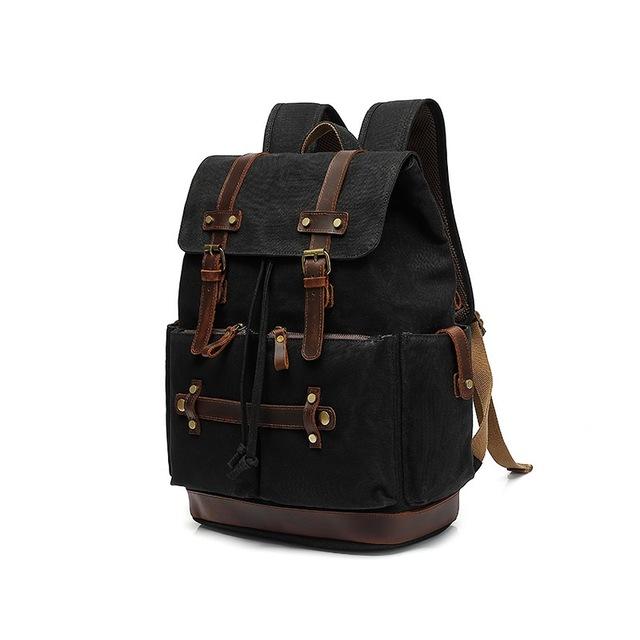 Army rucksack in black with full-grain leather flap, twin leather strap closures and antiqued brass buckles, Eiken Gotland model