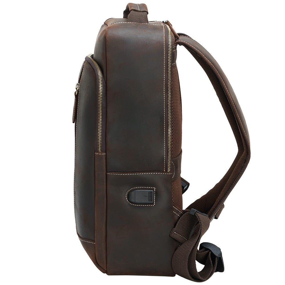 brown authentic leather backpack with clampshell opening