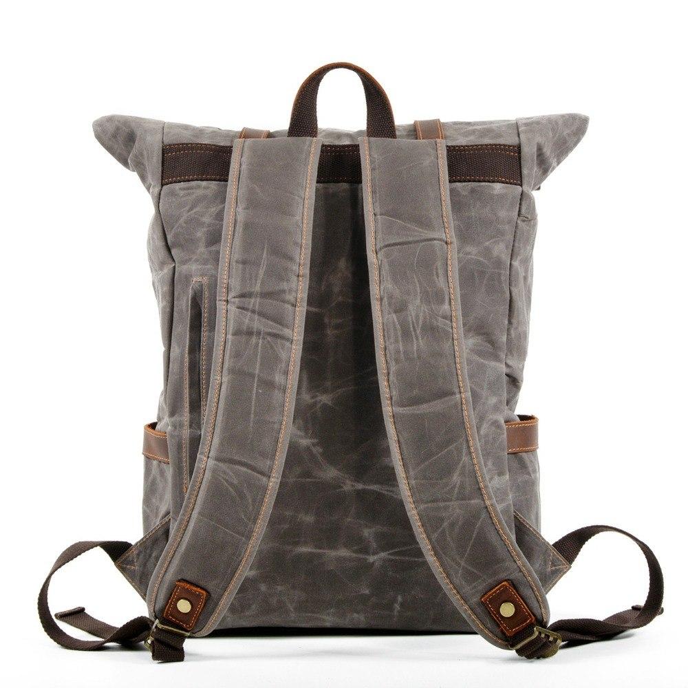 Three-quarter view of the coffee Berlin hipster backpack revealing depth, side cargo pocket and twin leather strap closures