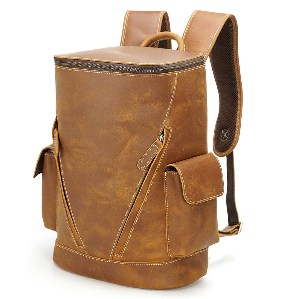 brown leather back pack with several external storages