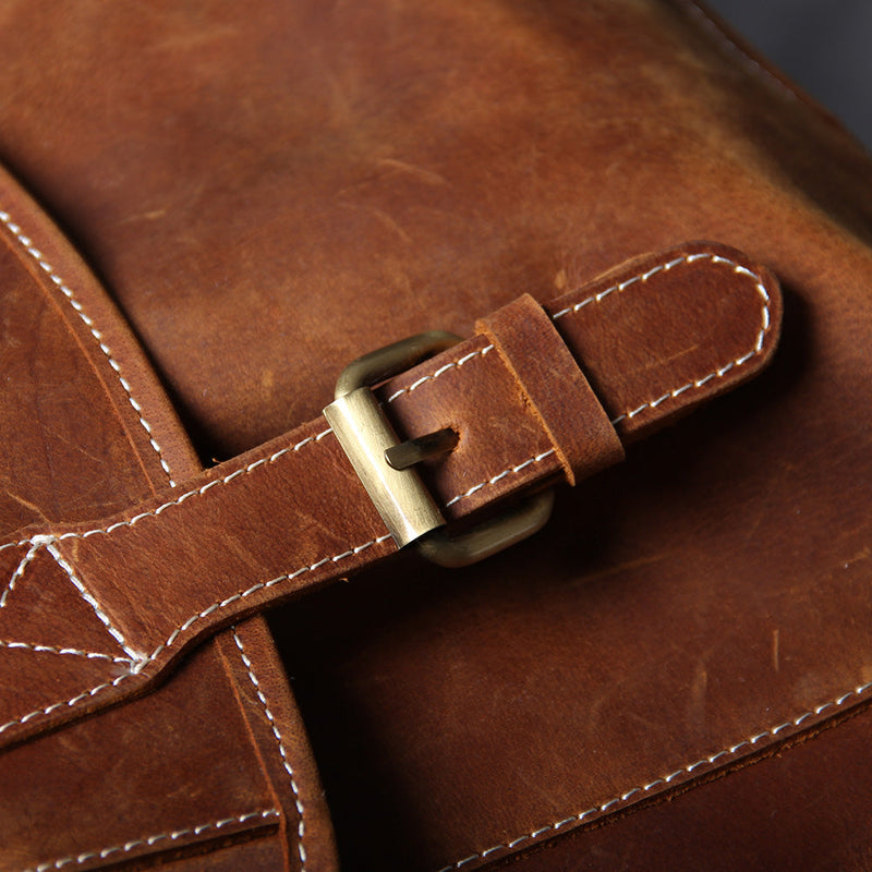 brown leather bookbag