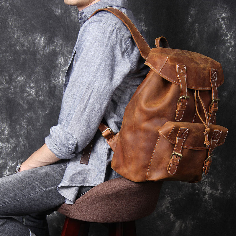 brown leather knapsack