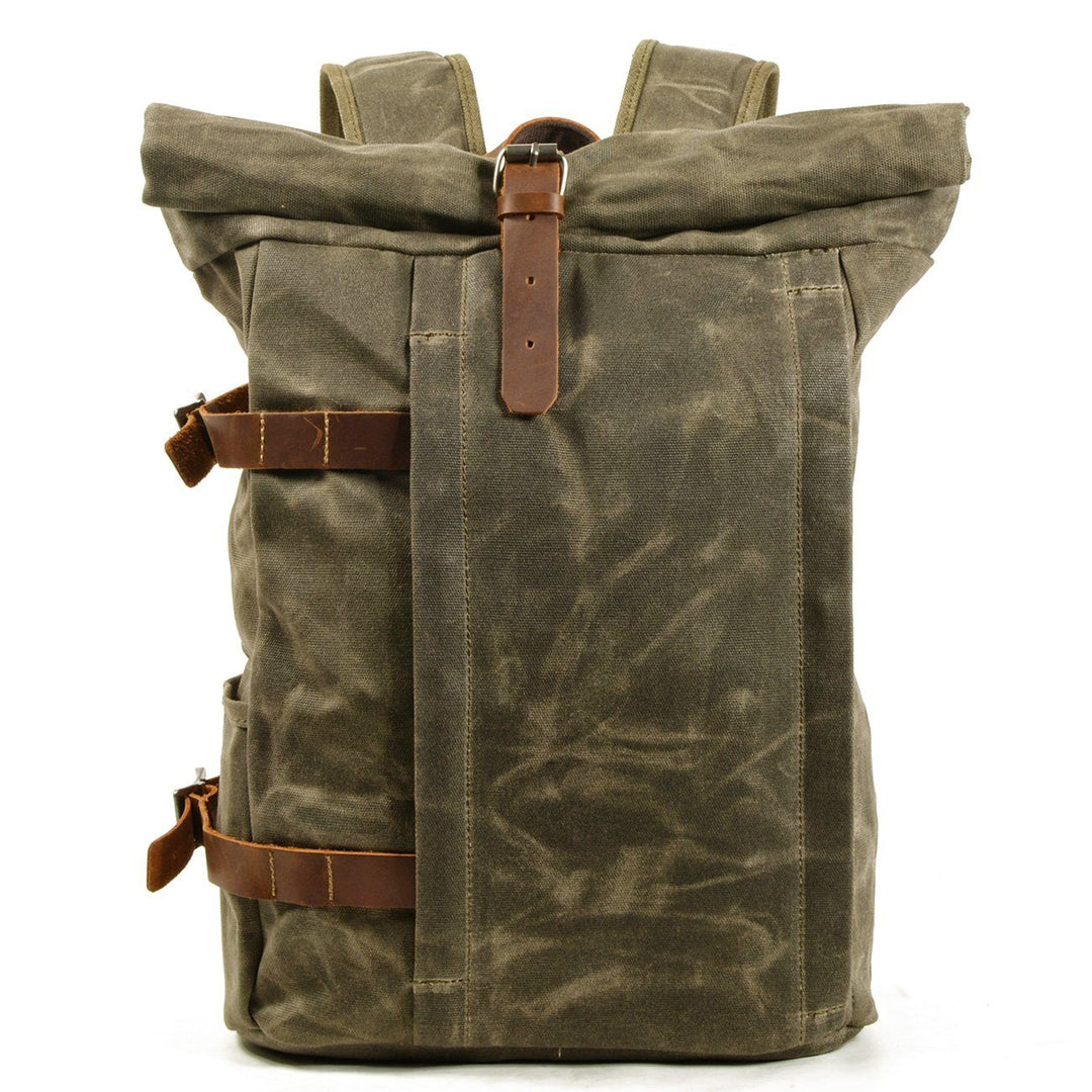 Canvas motorcycle backpack in army green with crazy horse leather flap, twin leather strap closures and brass buckles, Eiken Gstaad model