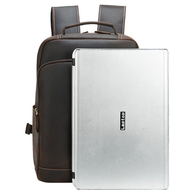 brown crazy horse backpack with a 15.6" laptop
