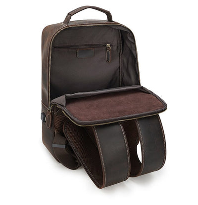 interior compartments of a brown crazy horse leather backpack with laptop sleeve and zipped pocket