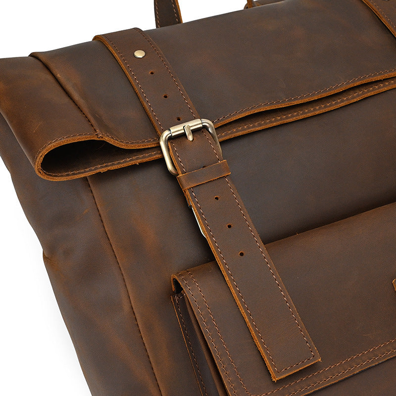fold top leather backpack