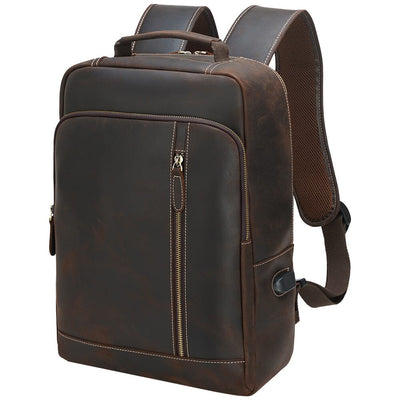 brown full grain leather backpack with top leather handle and usb charging port