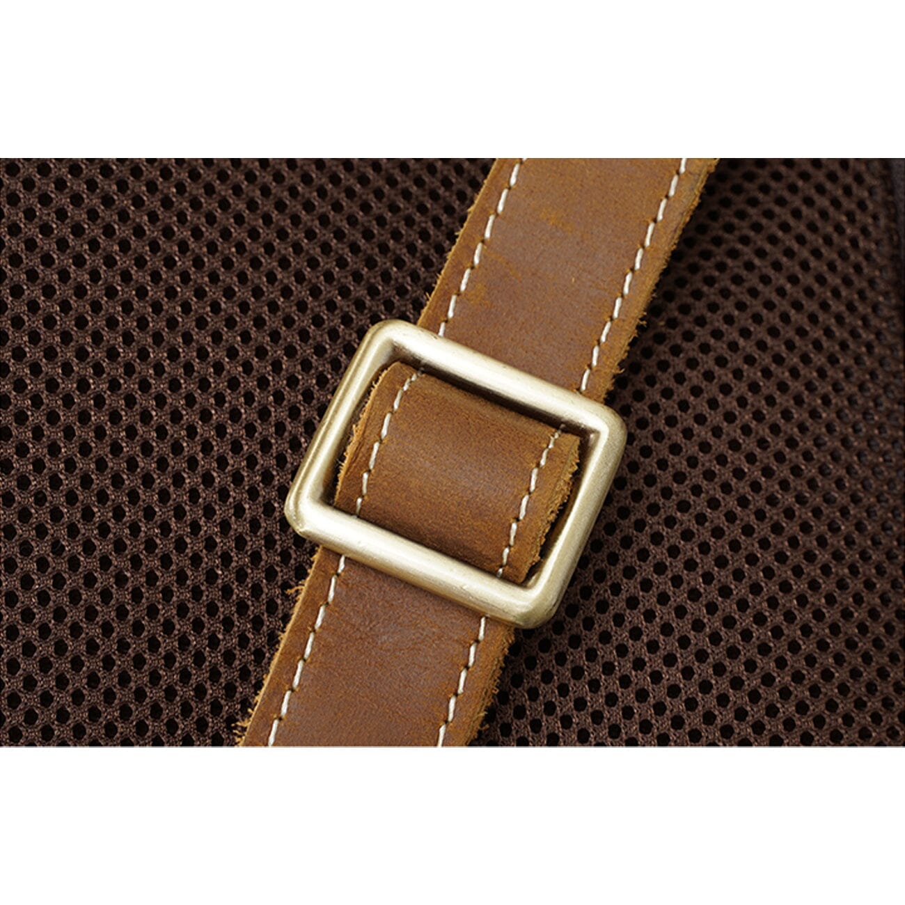 adjustable shoulder strap buckle of a genuine leather backpack