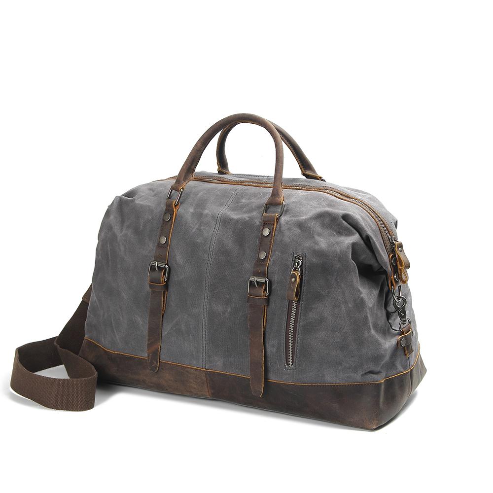 grey heavy duty canvas duffle bag with leather handles
