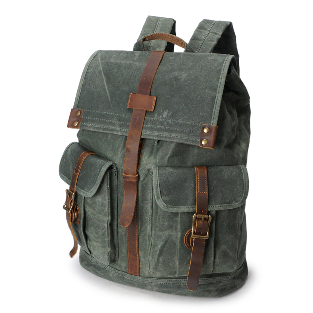 Detail of the crazy horse vintage leather rucksack flap and brass buckle on the Karlstad