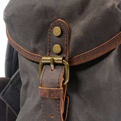 leather strap canvas backpack